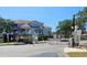 Secure gated entrance to a charming residential community with well-maintained landscaping, ensuring privacy and peace of mind at 14049 Fairway Island Dr # 118, Orlando, FL 32837