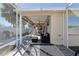 Outdoor patio with furniture for relaxing and entertaining, seamlessly blending indoor and outdoor living at 1451 Rosedale Way, The Villages, FL 32162