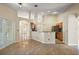 Spacious living room showcases tile floors and an open layout with kitchen access at 14624 Pine Lake St, Clermont, FL 34711