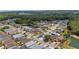 Overhead view of a residential area with interconnected streets and waterfront properties at 16608 W Citrus Pkwy, Clermont, FL 34714
