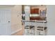 Cozy kitchen featuring a breakfast bar and stainless steel appliances at 16608 W Citrus Pkwy, Clermont, FL 34714