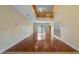Spacious living room with hardwood floors, high ceilings and natural light at 16608 W Citrus Pkwy, Clermont, FL 34714