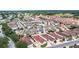 Stunning aerial view of a vibrant neighborhood with well-maintained homes and lush greenery at 17174 Se 76Th Caledonia Ter, The Villages, FL 32162