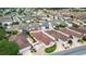Wide aerial perspective of the home in its neighborhood with mature trees and well-kept streets at 17174 Se 76Th Caledonia Ter, The Villages, FL 32162