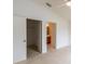 Bedroom with a walk-in closet and a bathroom at 17174 Se 76Th Caledonia Ter, The Villages, FL 32162