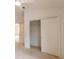 Bedroom with a spacious closet, offering plenty of storage for clothes and personal items at 17174 Se 76Th Caledonia Ter, The Villages, FL 32162
