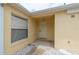 Inviting front entryway featuring white door and neutral colors at 17174 Se 76Th Caledonia Ter, The Villages, FL 32162