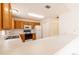 Well-lit kitchen area with wood finishes, ready for your cooking needs and perfect for Gathering meals at 17174 Se 76Th Caledonia Ter, The Villages, FL 32162