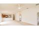 Spacious living area with access to kitchen and additional room, perfect for entertaining guests at 17174 Se 76Th Caledonia Ter, The Villages, FL 32162