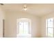 Bright and airy living room with neutral walls, offering a blank canvas for personal touches at 17174 Se 76Th Caledonia Ter, The Villages, FL 32162