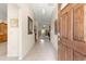 Elegant entryway with tile flooring, neutral walls, and a view into the living spaces at 1723 Townsend Ter, The Villages, FL 32162