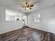 Dining room area featuring updated flooring, lots of light, and seamless transition to kitchen at 1905 Selleen Dr, Eustis, FL 32726