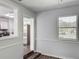Dining area with a view into the kitchen, offering easy access to appliances and cooking at 1905 Selleen Dr, Eustis, FL 32726