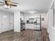 Modern kitchen with stainless steel appliances, white cabinets, and stylish countertops at 1905 Selleen Dr, Eustis, FL 32726