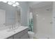 Bathroom featuring a shower with curtain and a sink with grey vanity at 2124 Hames Ln, The Villages, FL 32162