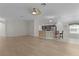 Spacious open-concept design seamlessly connects the living area, kitchen, and dining spaces at 2124 Hames Ln, The Villages, FL 32162
