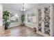Bright dining area with natural light and stylish built-in display cabinet at 2237 Avon Loop, The Villages, FL 32162