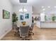 Cozy dining area with natural light and seamless access to the well-equipped kitchen at 2237 Avon Loop, The Villages, FL 32162