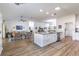 Open concept living space showcasing a spacious kitchen island and seamless flow at 2237 Avon Loop, The Villages, FL 32162