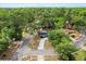 Aerial view of the home displaying mature trees and the surrounding neighborhood at 227 Oak Rd, Winter Springs, FL 32708