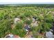 Aerial view of a neighborhood with mature trees at 227 Oak Rd, Winter Springs, FL 32708