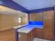 View of kitchen and living room from breakfast bar at 26 Weston Rd, Leesburg, FL 34748