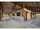 An interior view of a horse stall barn at 27011 Se Highway 42, Umatilla, FL 32784
