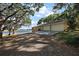 A beautiful home with a large two-car garage is situated on waterfront property at 27011 Se Highway 42, Umatilla, FL 32784