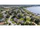 Enjoy a spacious home in a lakeside community with lush trees and community boat docks at 2750 Coral Reef Way, Tavares, FL 32778
