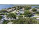 Aerial view of a lovely single-Gathering home in a well-established neighborhood near a lake at 2750 Coral Reef Way, Tavares, FL 32778