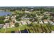 Enjoy a spacious home in a lakeside community with lush trees and community boat docks at 2750 Coral Reef Way, Tavares, FL 32778