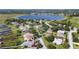 Enjoy a spacious home in a lakeside community with lush trees and community boat docks at 2750 Coral Reef Way, Tavares, FL 32778