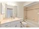 Bathroom with vanity, mirror, tiled shower/tub combination at 2750 Coral Reef Way, Tavares, FL 32778