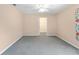 Neutral bedroom featuring carpet flooring, ceiling fan, and closet at 2750 Coral Reef Way, Tavares, FL 32778