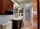 Bathroom with a pedestal sink, vanity, and medicine cabinet at 2833 Beal St, Deltona, FL 32738