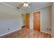 Neutral bedroom with wood-look floors at 2833 Beal St, Deltona, FL 32738