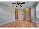 Spacious bedroom with a ceiling fan and ample closet space at 2833 Beal St, Deltona, FL 32738