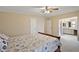 Comfortable bedroom featuring an attached bathroom, ensuring convenience at 2921 Wekiva Rd, Tavares, FL 32778