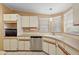 Cozy kitchen with stainless steel appliances, wood countertops, and tiled flooring at 2921 Wekiva Rd, Tavares, FL 32778