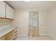 Office space featuring built-in cabinets and desk at 2921 Wekiva Rd, Tavares, FL 32778