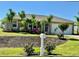 Inviting home exterior with lush landscaping, well-maintained lawn, and cozy curb appeal at 30 Olive Cir, Ocala, FL 34472