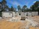 Close-up on the gray block walls of a new home under construction amid a rural landscape at 30551 Saffron Ave, Eustis, FL 32736