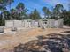 Image shows the block framework of a new home under construction with windows and door openings at 30551 Saffron Ave, Eustis, FL 32736
