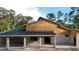 The exterior of a new single-Gathering home under construction at 30551 Saffron Ave, Eustis, FL 32736