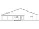 Rear exterior elevation featuring a window, door, and simple roofline at 30551 Saffron Ave, Eustis, FL 32736