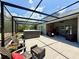 Spacious screened-in pool and lounge area perfect for outdoor entertaining at 31857 Dahlia Ct, Eustis, FL 32736