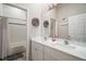 Bright bathroom with double vanity, marble countertop, and updated fixtures at 31857 Dahlia Ct, Eustis, FL 32736