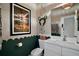 Charming bathroom with creative wall decor, elegant fixtures, and a modern vanity at 31857 Dahlia Ct, Eustis, FL 32736