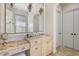 Bright bathroom featuring dual vanities, makeup area, and a shower/tub combo that is ready for relaxation at 32543 Hawks Lake Ln, Sorrento, FL 32776