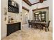 Formal dining room featuring a wine bar, and custom cabinetry at 32543 Hawks Lake Ln, Sorrento, FL 32776